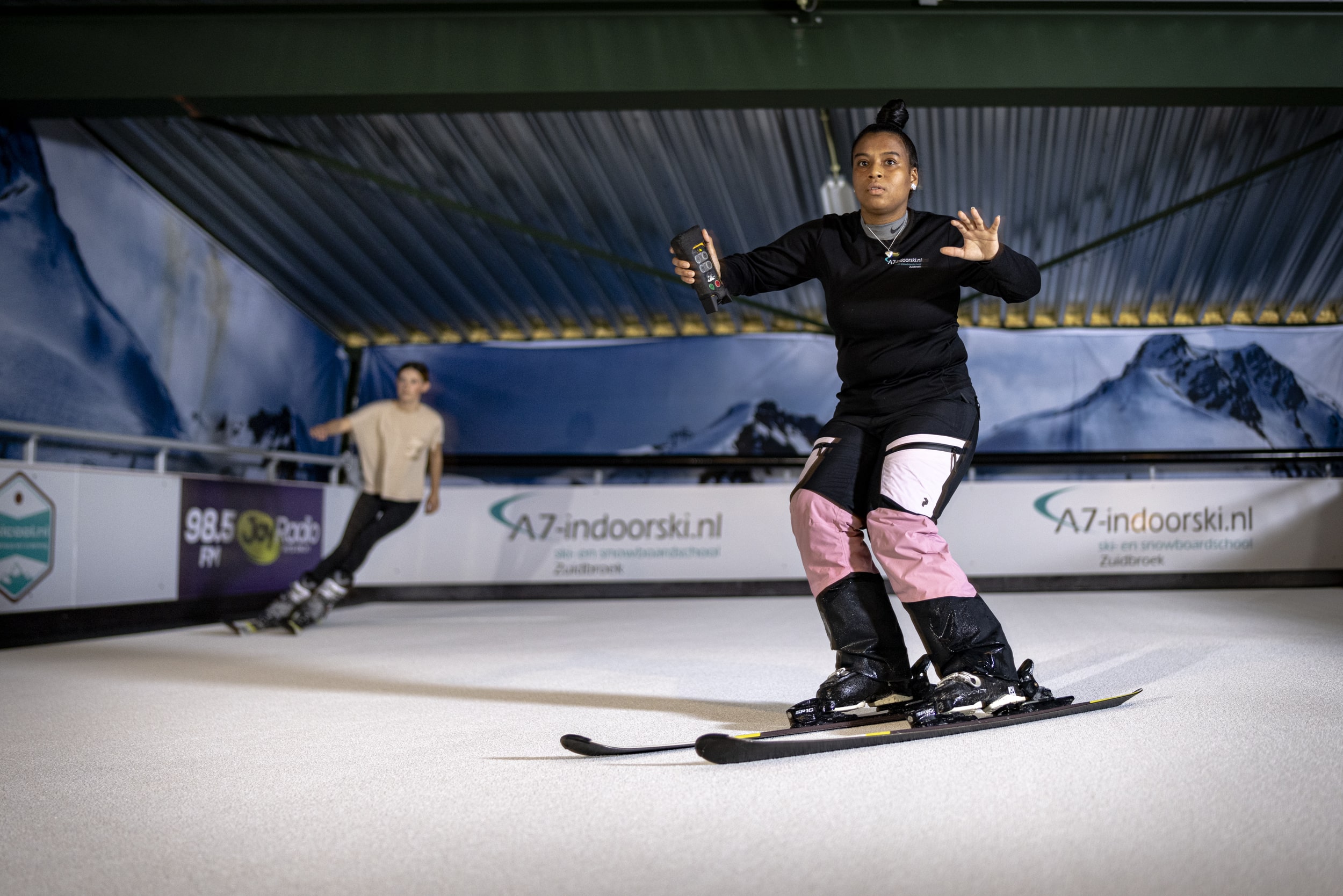 Skiing on a indoor ski simulator